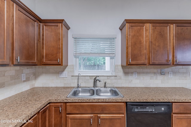 kitchen with tasteful backsplash, sink, and dishwasher