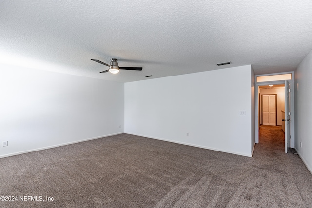 unfurnished room with ceiling fan, a textured ceiling, and carpet floors