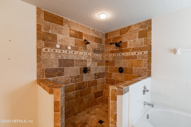 bathroom featuring a textured ceiling