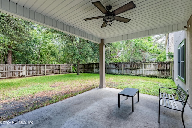 view of patio with ceiling fan and a fenced backyard