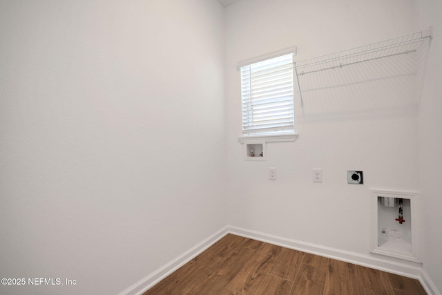 clothes washing area with hookup for a washing machine, wood-type flooring, and electric dryer hookup