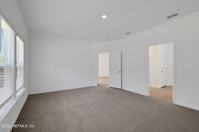 view of carpeted spare room