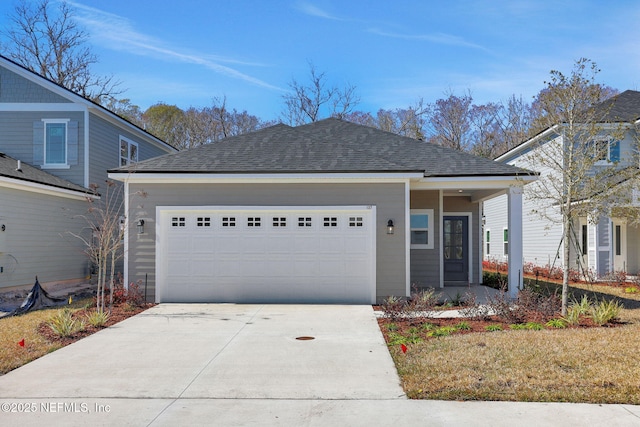 view of front of property featuring a garage