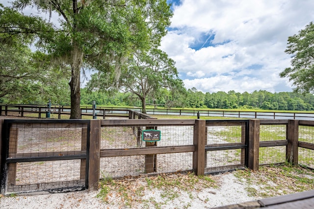 view of gate featuring a rural view