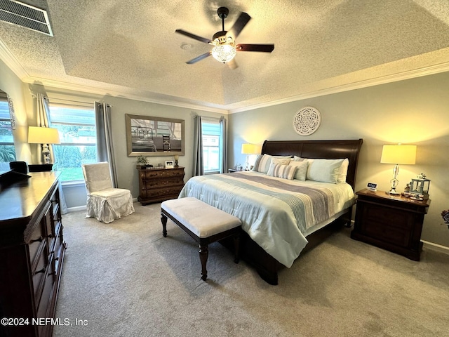 bedroom with carpet, multiple windows, visible vents, and crown molding