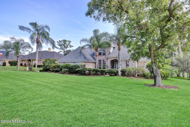 view of front of property with a front lawn