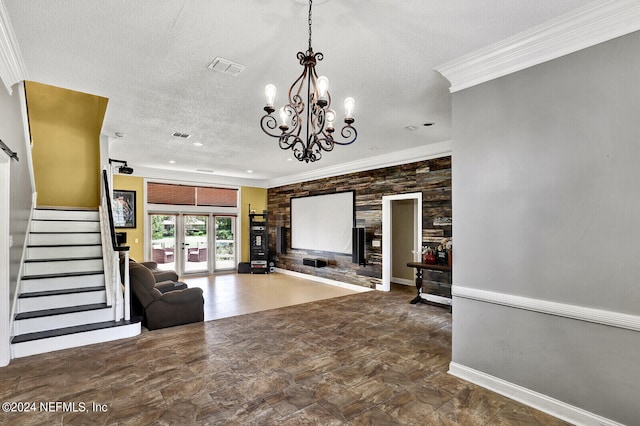 unfurnished living room with a textured ceiling, crown molding, and a chandelier