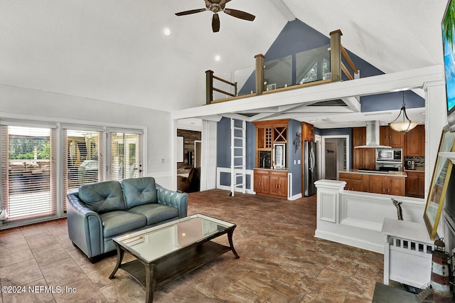 living room featuring ceiling fan, beam ceiling, and high vaulted ceiling