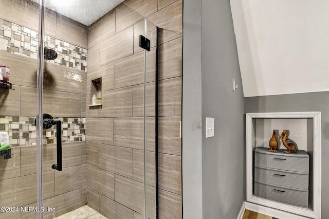 bathroom with an enclosed shower