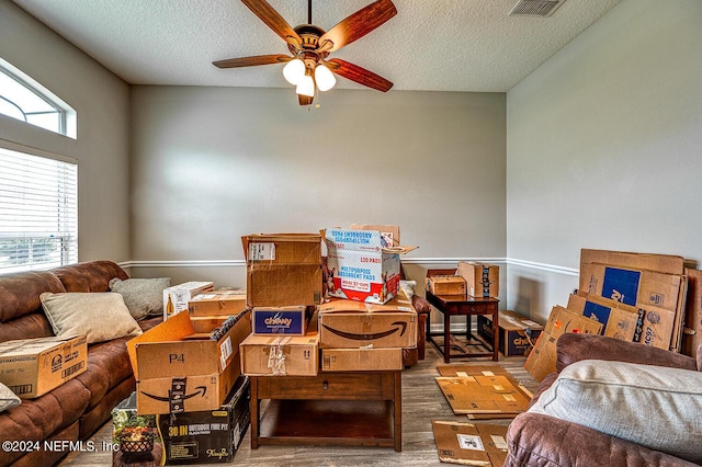 storage room featuring visible vents and ceiling fan