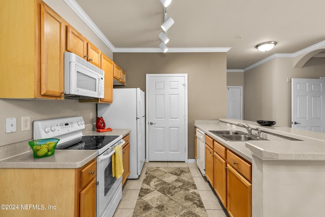 kitchen featuring kitchen peninsula, white appliances, crown molding, and track lighting