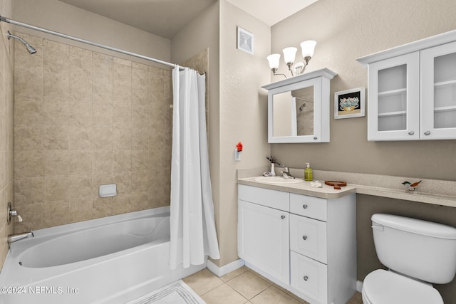 full bathroom featuring tile patterned flooring, vanity, shower / bath combo, and toilet