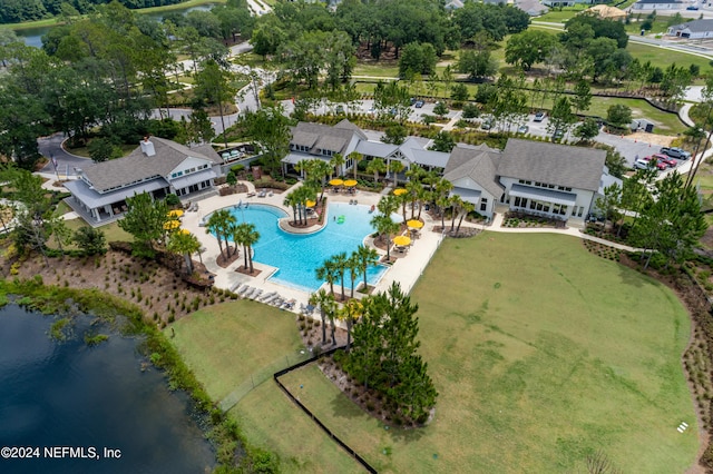 birds eye view of property featuring a water view