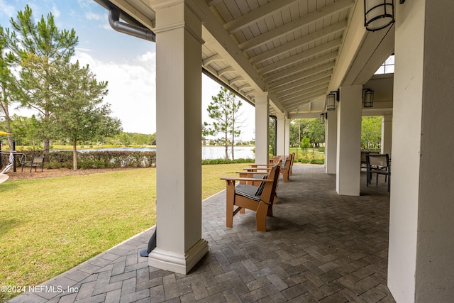 view of patio / terrace with a water view