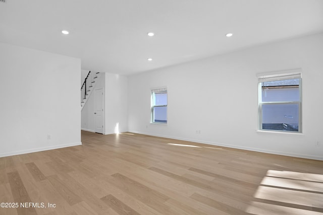 unfurnished room featuring light hardwood / wood-style flooring