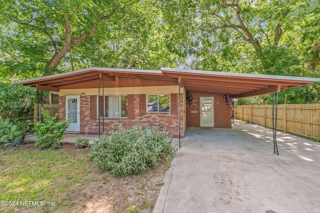 view of front of house with a carport