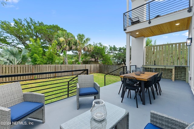 view of patio / terrace with a balcony