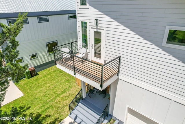 view of home's exterior featuring a lawn