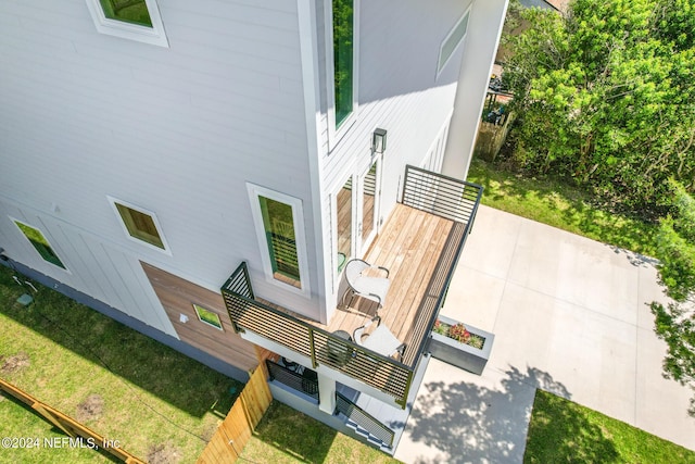 view of side of property with a yard