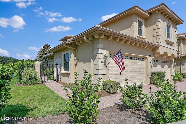 view of property exterior featuring a garage