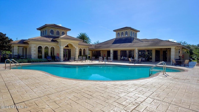 view of pool with a patio