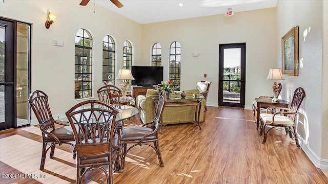 dining area featuring light hardwood / wood-style floors and ceiling fan