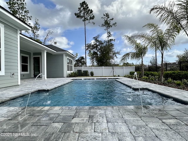 view of swimming pool with a patio, a fenced backyard, and a fenced in pool