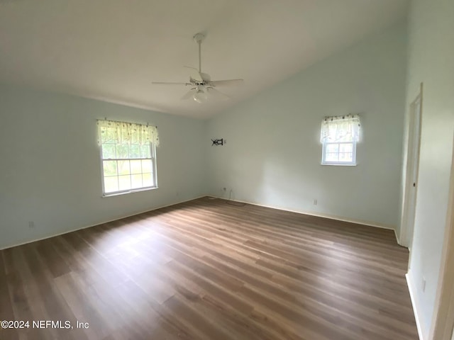 unfurnished room featuring vaulted ceiling, ceiling fan, and wood finished floors