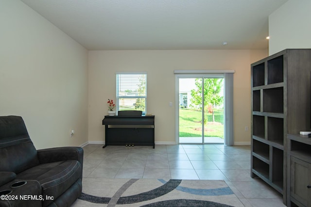 sitting room with light tile patterned flooring