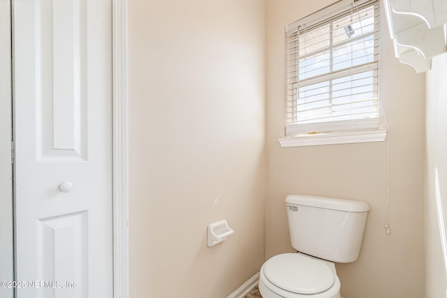 bathroom featuring toilet