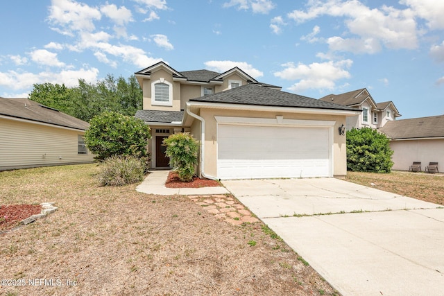 traditional-style house with an attached garage, a front yard, driveway, and stucco siding