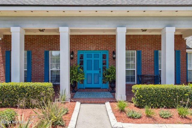 property entrance with a porch