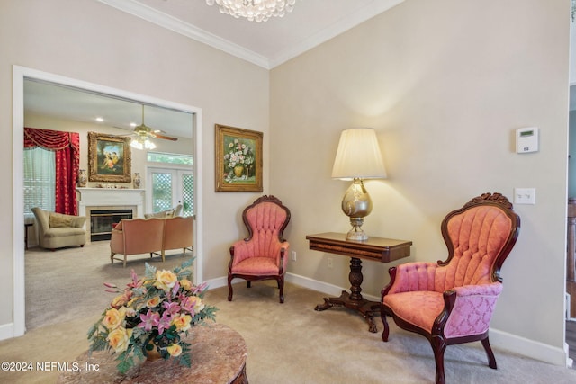 living area with ornamental molding, a chandelier, and light carpet