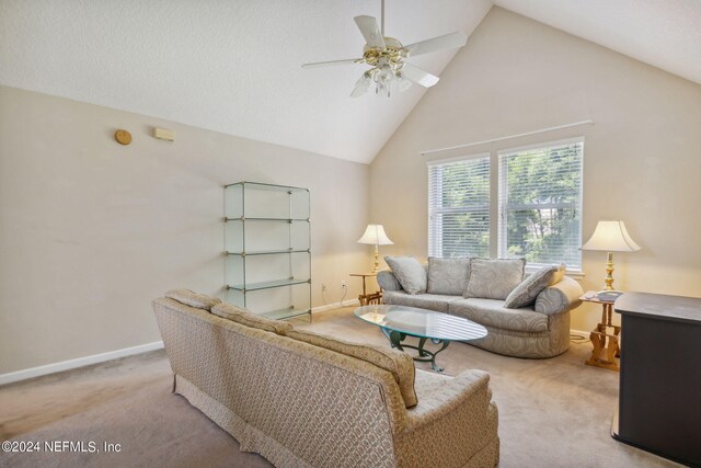 living room with carpet, high vaulted ceiling, and ceiling fan