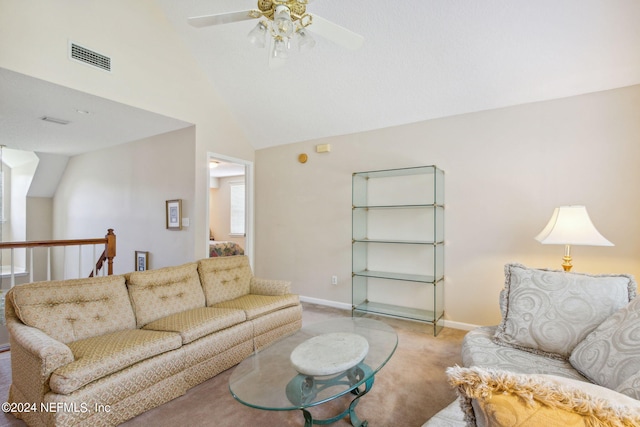 living room with ceiling fan, light colored carpet, and lofted ceiling