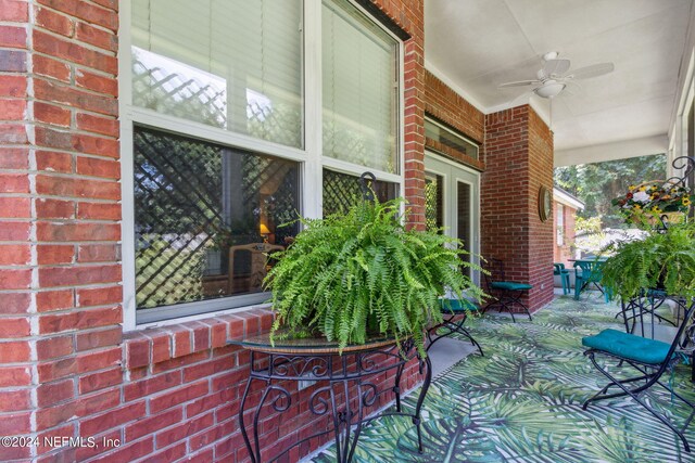 view of patio / terrace featuring ceiling fan