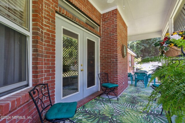 entrance to property featuring french doors