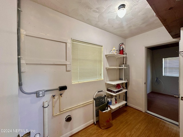 miscellaneous room with wood-type flooring