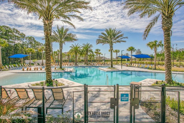 view of swimming pool featuring a patio area