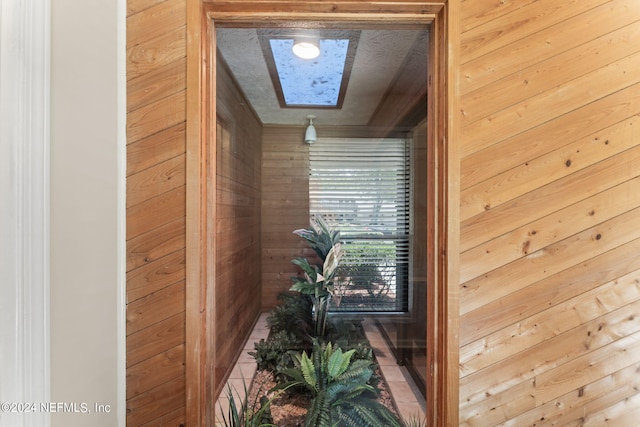 room details with a skylight and wood walls