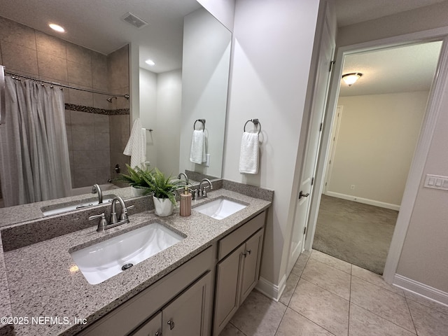 95014 Brookhill Pl, Fernandina Beach, FL 32034 - full bath with double vanity, tile patterned floors, shower / bathtub combination with curtain, and recessed lighting