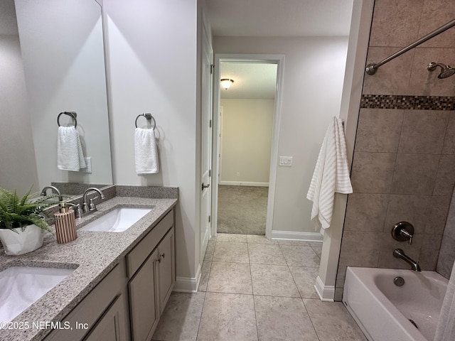 95014 Brookhill Pl, Fernandina Beach, FL 32034 - bathroom with double vanity, tile patterned flooring, and  shower combination