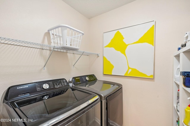 laundry room with separate washer and dryer