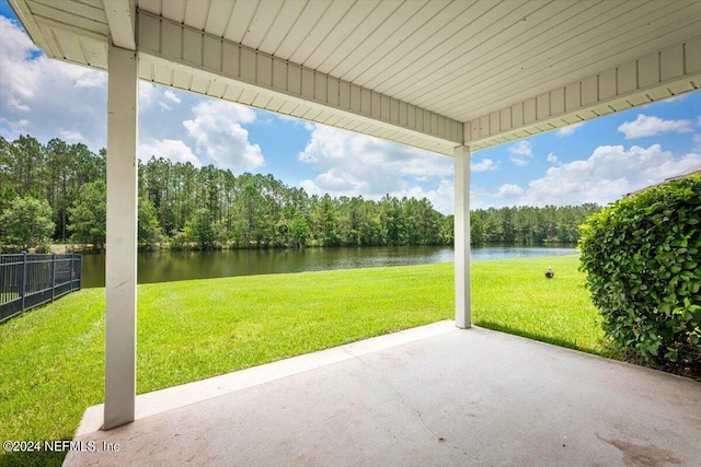 view of patio / terrace with a water view