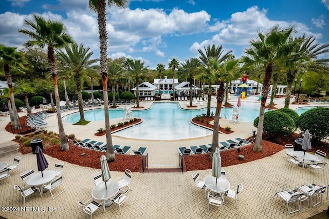 view of swimming pool featuring a patio area