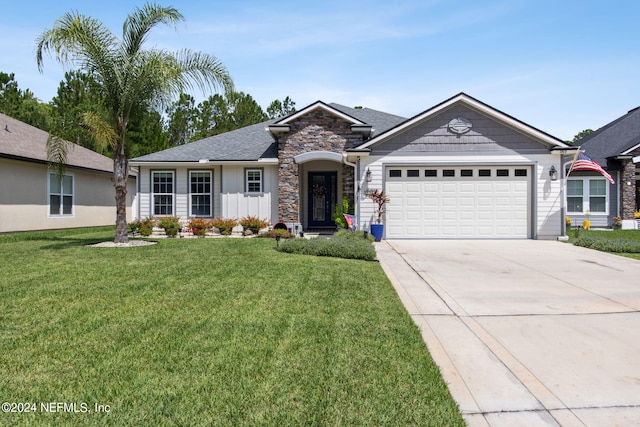 ranch-style home with a garage and a front yard