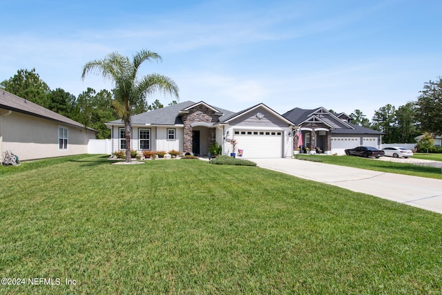 ranch-style house with a front yard and a garage