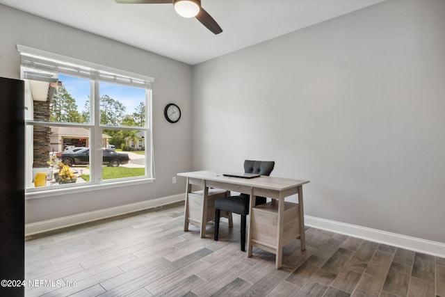 office area with ceiling fan and light wood-type flooring