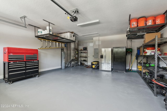 garage featuring electric panel, stainless steel fridge, water heater, and a garage door opener