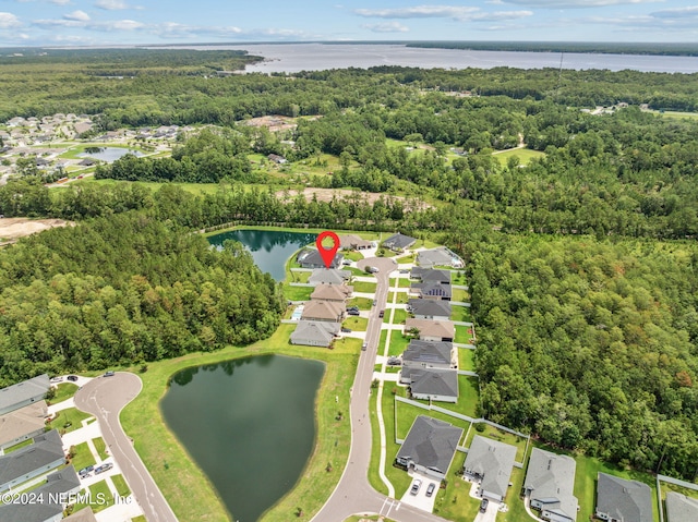 birds eye view of property featuring a water view